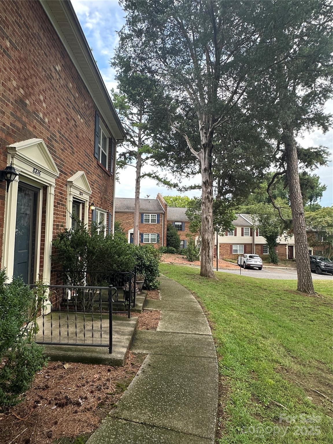 8816 Hunter Ridge Drive Charlotte, NC 28226 - Photo 14 of 14 a view of a yard with plants and trees