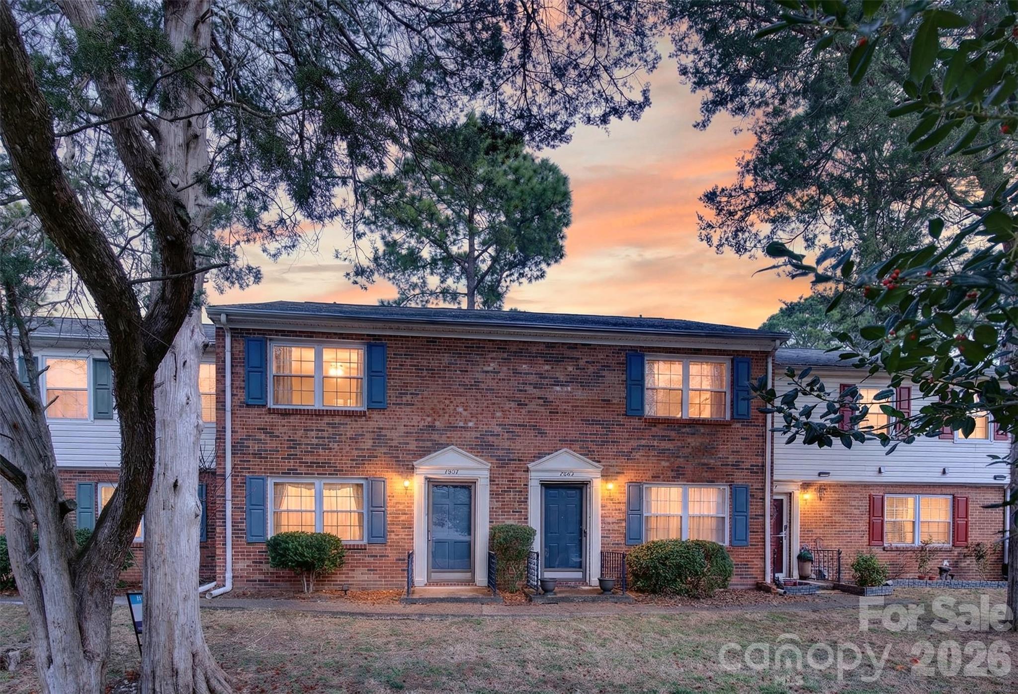 8816 Hunter Ridge Drive Charlotte, NC 28226 - Photo 2 of 14 a front view of a house with a tree