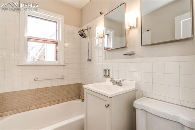 611 Prairie Road Colorado Springs, CO 80909 - Photo 11 of 18 Centrally located in the home for family and guests.