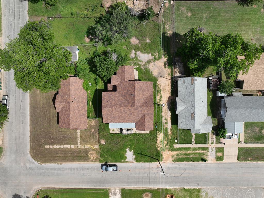 1428 Texas Street Vernon, TX 76384 - Photo 4 of 30 an aerial view of residential houses with outdoor space and parking
