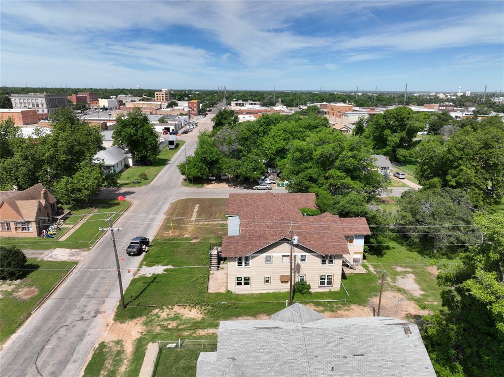 1428 Texas Street Vernon, TX 76384 - Photo 5 of 30 an aerial view of a house with a yard