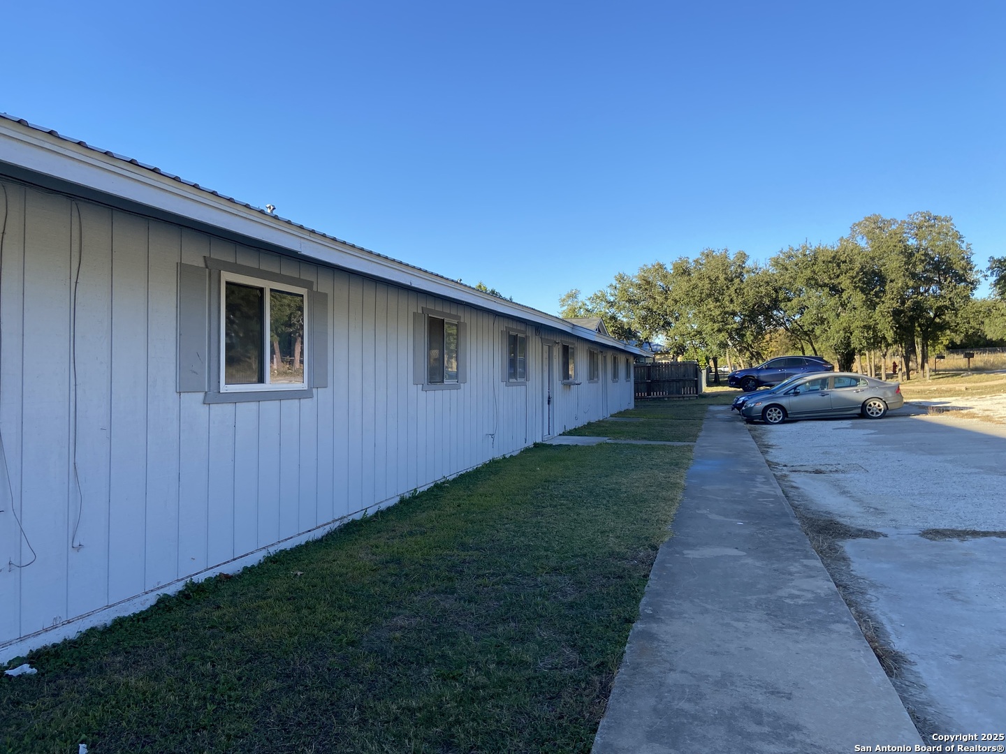 a view of a back yard of the house