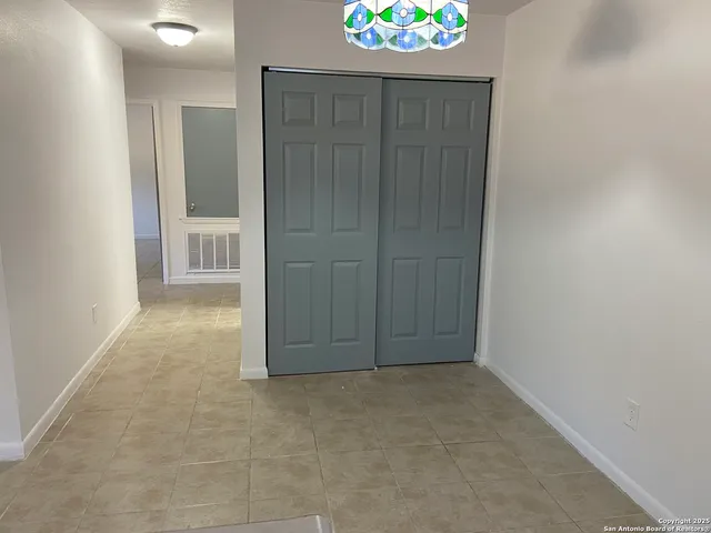 an empty room with a door