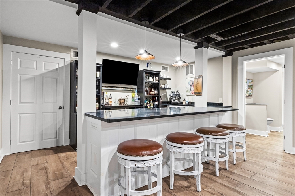 9 Winthrop Street Danvers, MA 01923 - Photo 30 of 41 a kitchen with a table and chairs