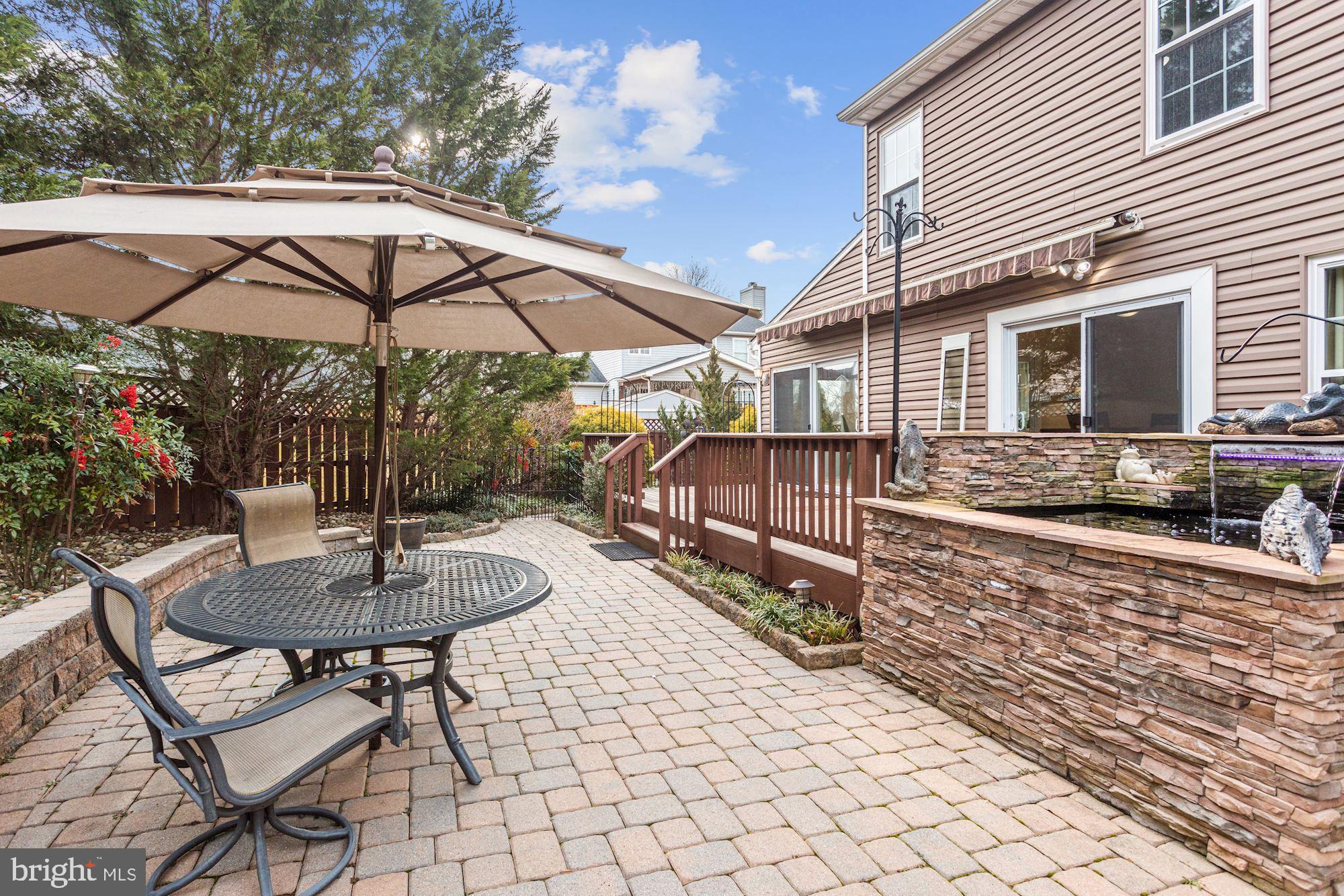 6689 Hunter Road Elkridge, MD 21075 - Photo 31 of 43 Paver Patio & Koi Pond