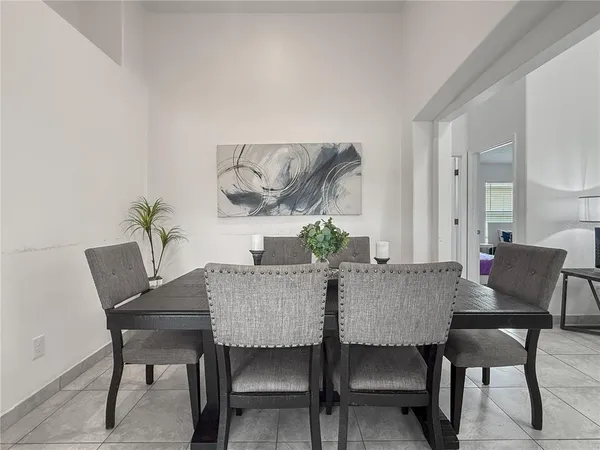 a view of a dining room with furniture