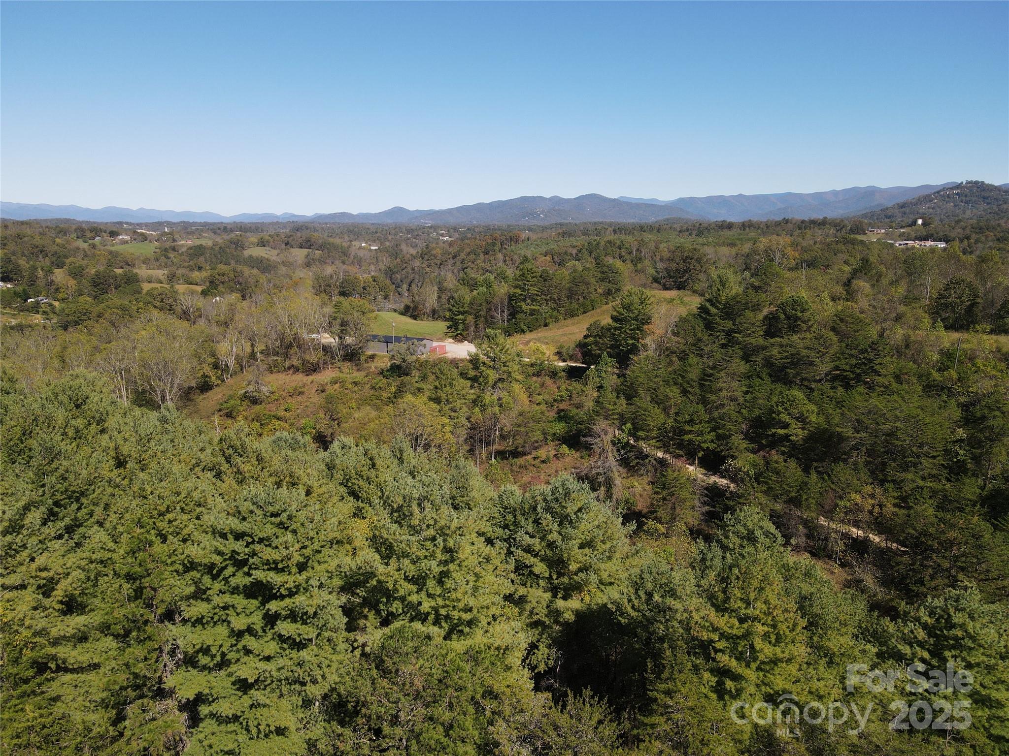 150 Old Macedonia Road Asheville, NC 28804 - Photo 5 of 24 an aerial view of residential houses with outdoor space and trees