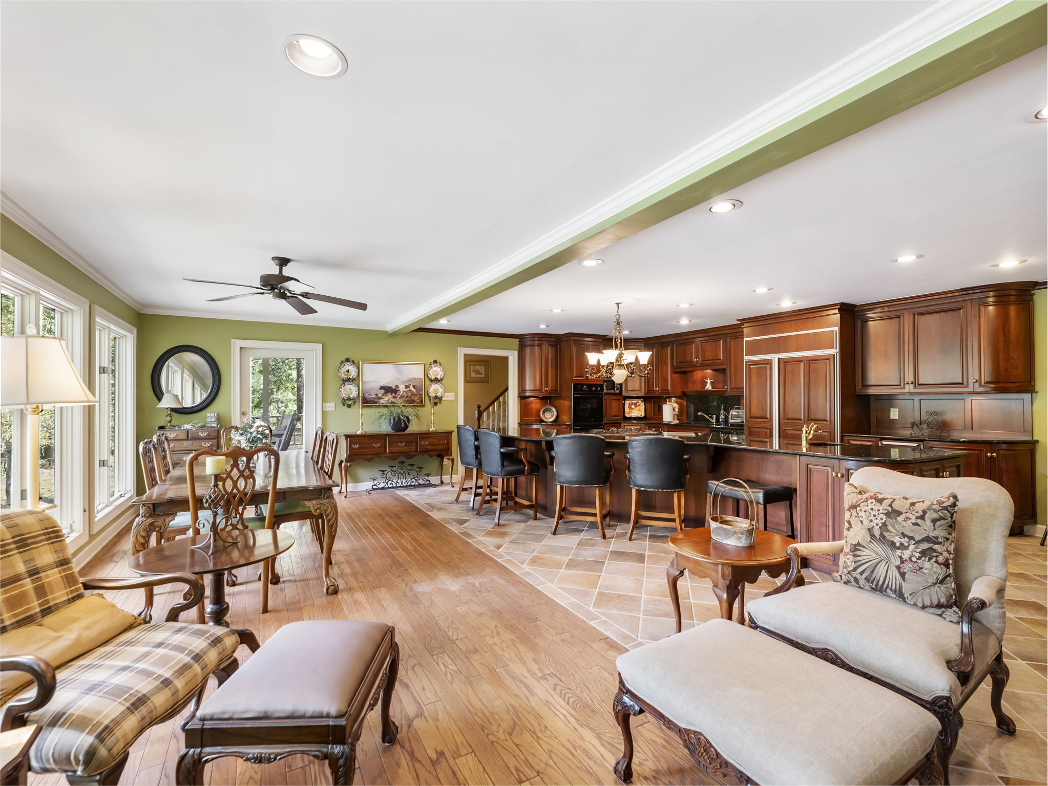 4394 Holly Springs Road Pendergrass, GA 30567 - Photo 9 of 80 a living room with lots of furniture and view of kitchen