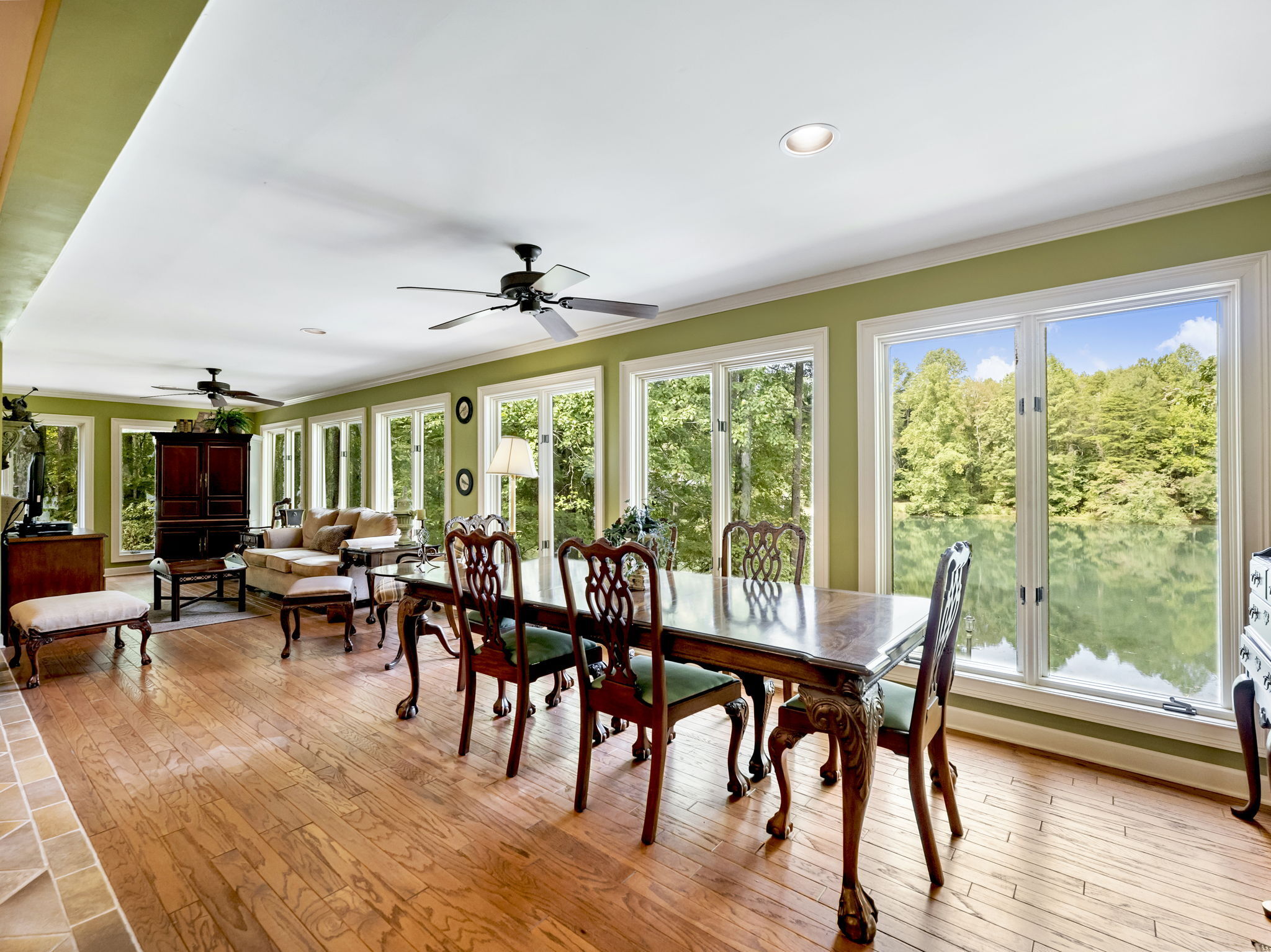 4394 Holly Springs Road Pendergrass, GA 30567 - Photo 10 of 80 a view of a dining room with furniture window and wooden floor