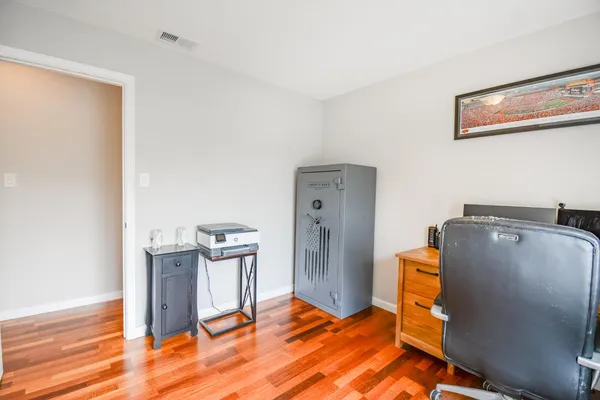 a bed room with a bed and cabinets