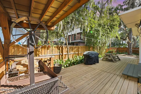 a kitchen with a stove and a refrigerator