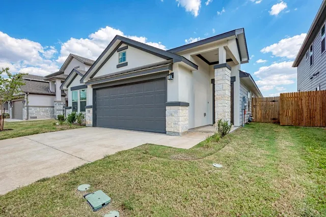 a front view of house with yard