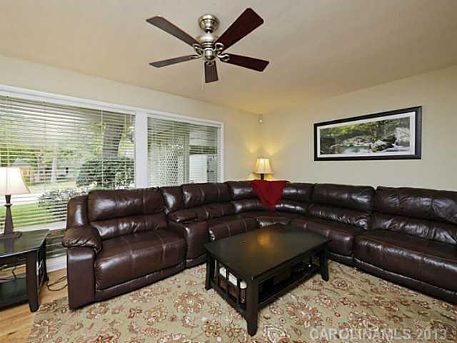 4216 Murrayhill Road Charlotte, NC 28209 - Photo 4 of 16 a living room with furniture and a window