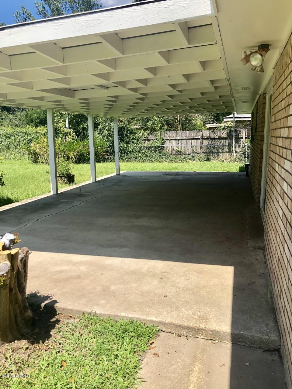 118 Normandy Road Lafayette, LA 70503 - Photo 3 of 13 118 Normandy back patio