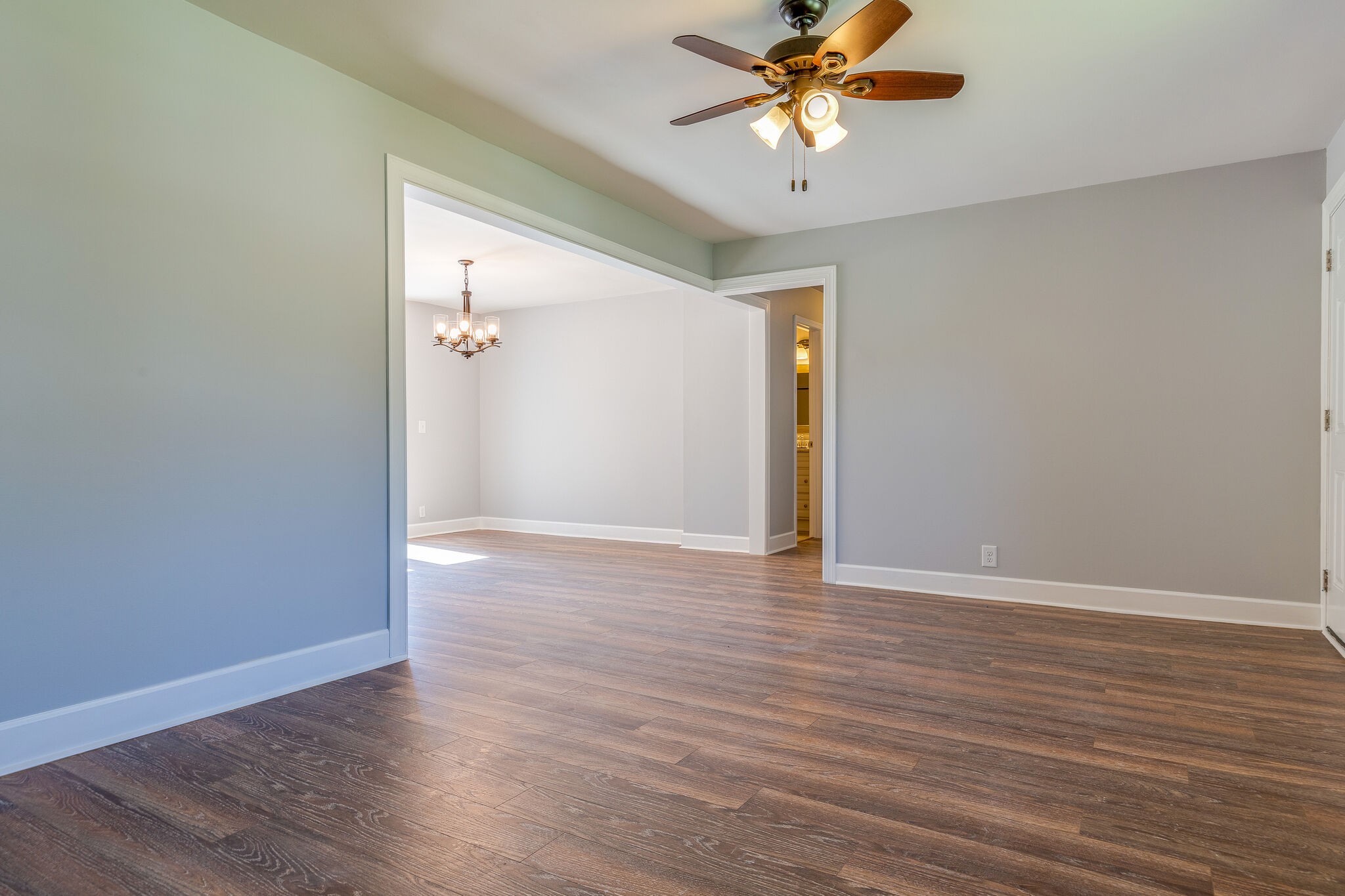 75 Benzing Road Antioch, TN 37013 - Photo 1 of 23 a view of a livingroom with a ceiling fan and wooden floor