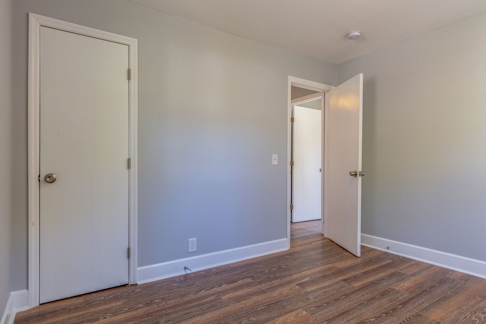 75 Benzing Road Antioch, TN 37013 - Photo 15 of 23 a view of an empty room with wooden floor and closet
