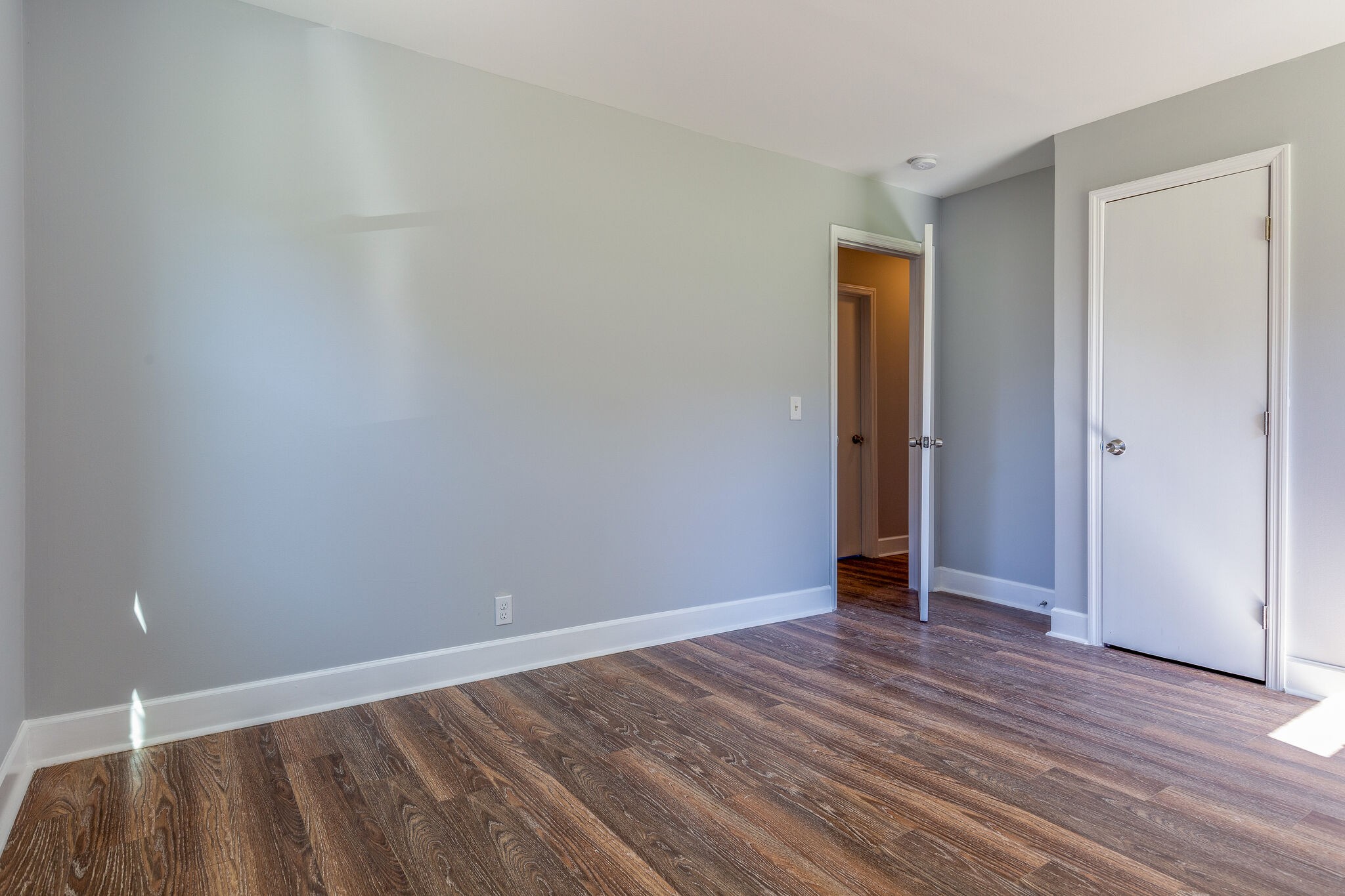 75 Benzing Road Antioch, TN 37013 - Photo 18 of 23 a view of an empty room with wooden floor