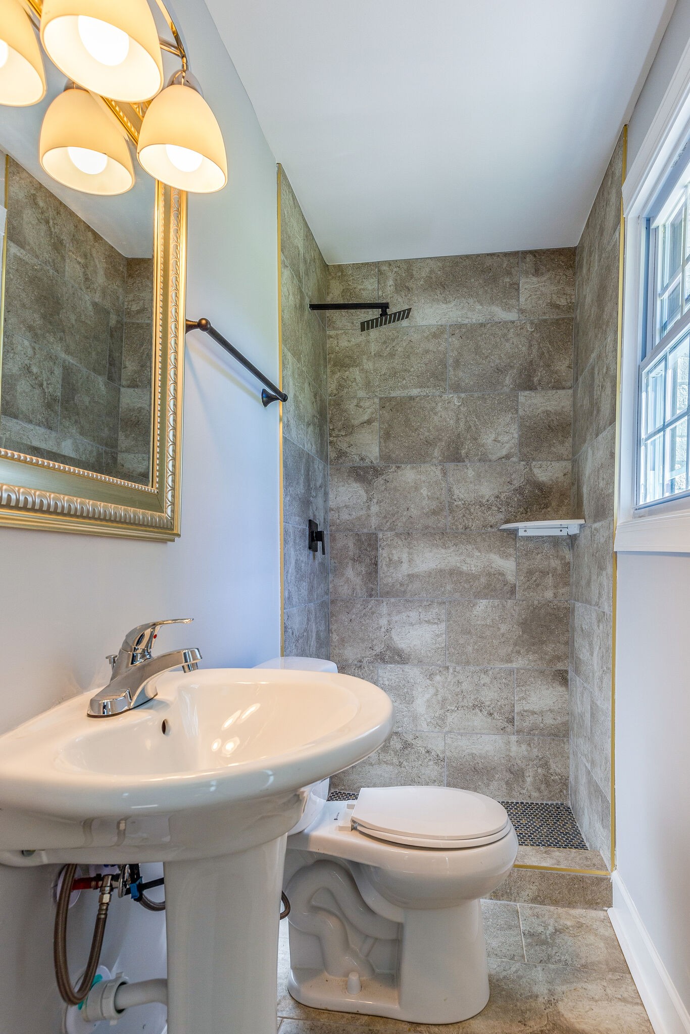 75 Benzing Road Antioch, TN 37013 - Photo 20 of 23 a bathroom with a sink a toilet and shower