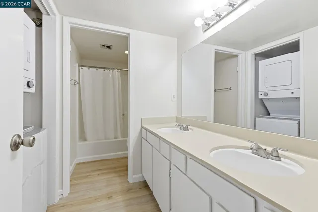 a bathroom with a sink and mirror