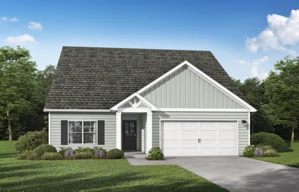 a view of a house with a yard and garage