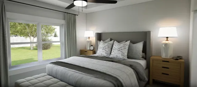 a bedroom with a large bed and a window