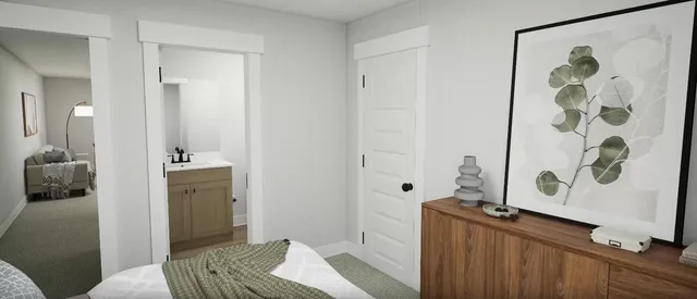 a bathroom with a granite countertop sink a toilet and shower