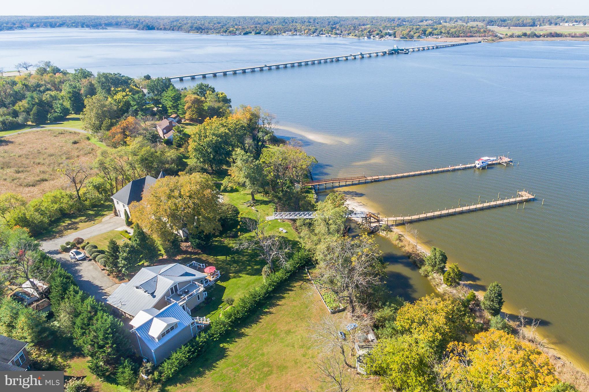 6155 Hallowing Point Road Prince Frederick, MD 20678 - Photo 4 of 29 a view of a lake with a mountain in the background