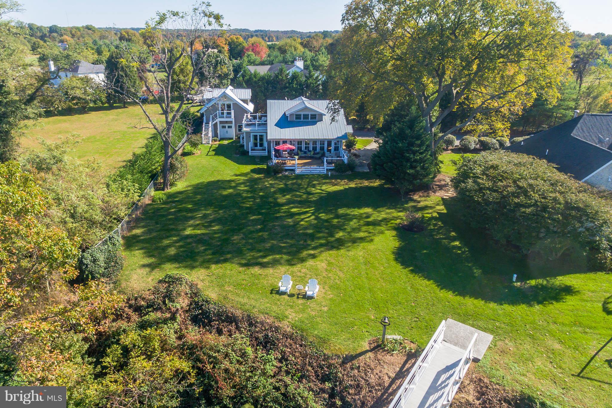 6155 Hallowing Point Road Prince Frederick, MD 20678 - Photo 5 of 29 a aerial view of a house with a yard basket ball court and outdoor seating