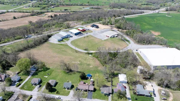 an aerial view of a house with outdoor space