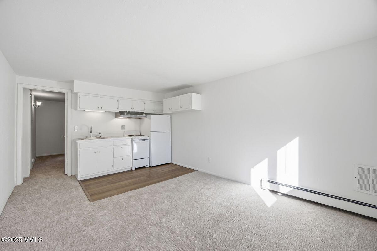 2099 Chamonix Lane, Unit 1C Vail, CO 81657 - Photo 2 of 29 Living/Dining/Kitchen