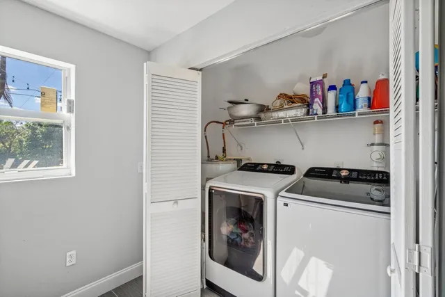 a utility room with dryer and washer