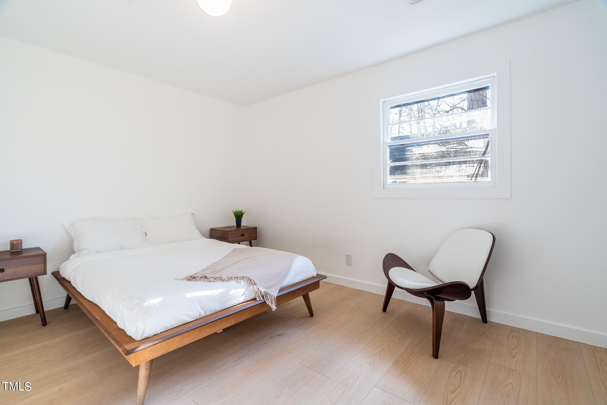 332 Erwin Road Chapel Hill, NC 27514 - Photo 13 of 35 a bedroom with a bed chair and a window