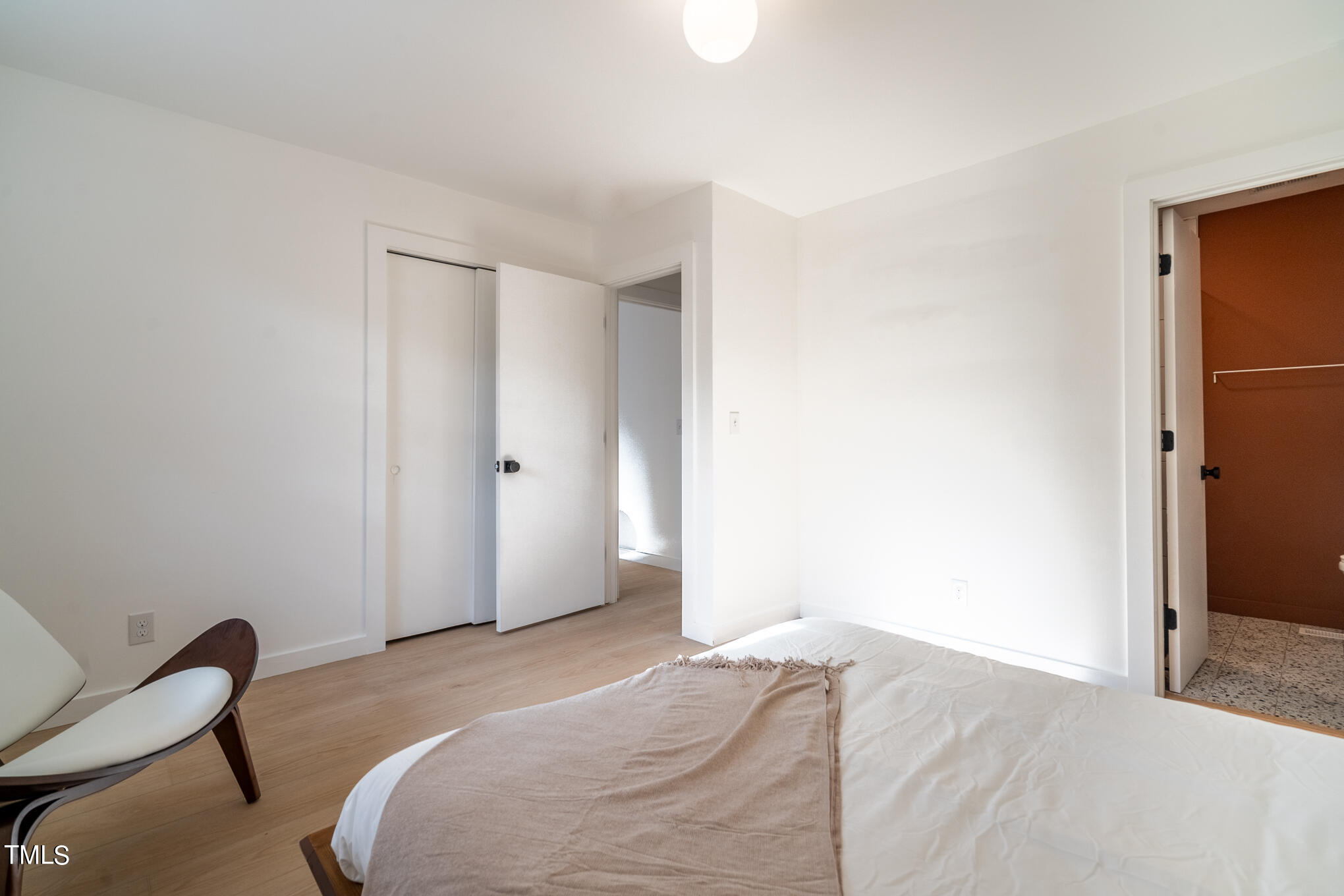 332 Erwin Road Chapel Hill, NC 27514 - Photo 14 of 35 a bedroom with a bed and chair