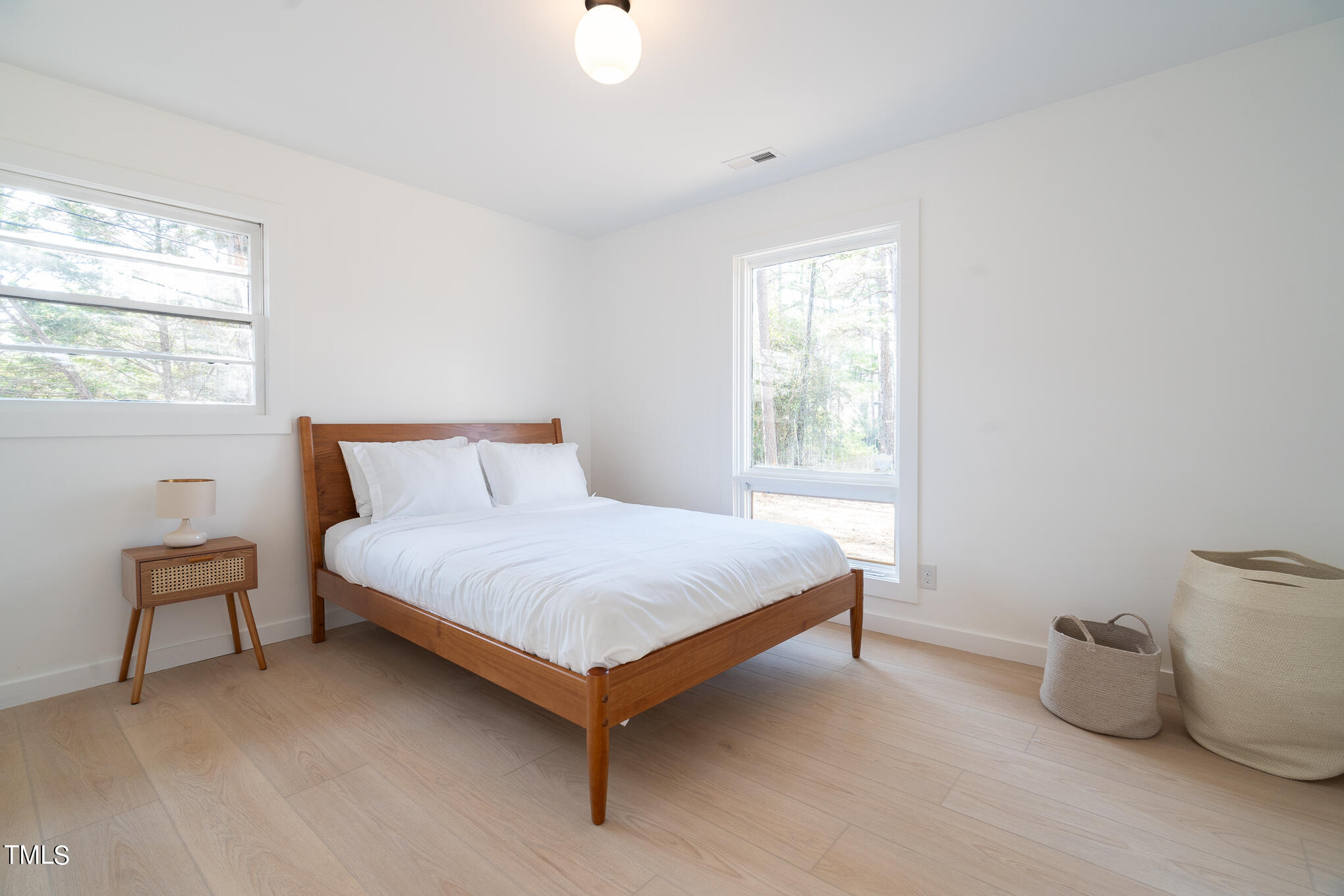 332 Erwin Road Chapel Hill, NC 27514 - Photo 16 of 35 a bedroom with a bed and window