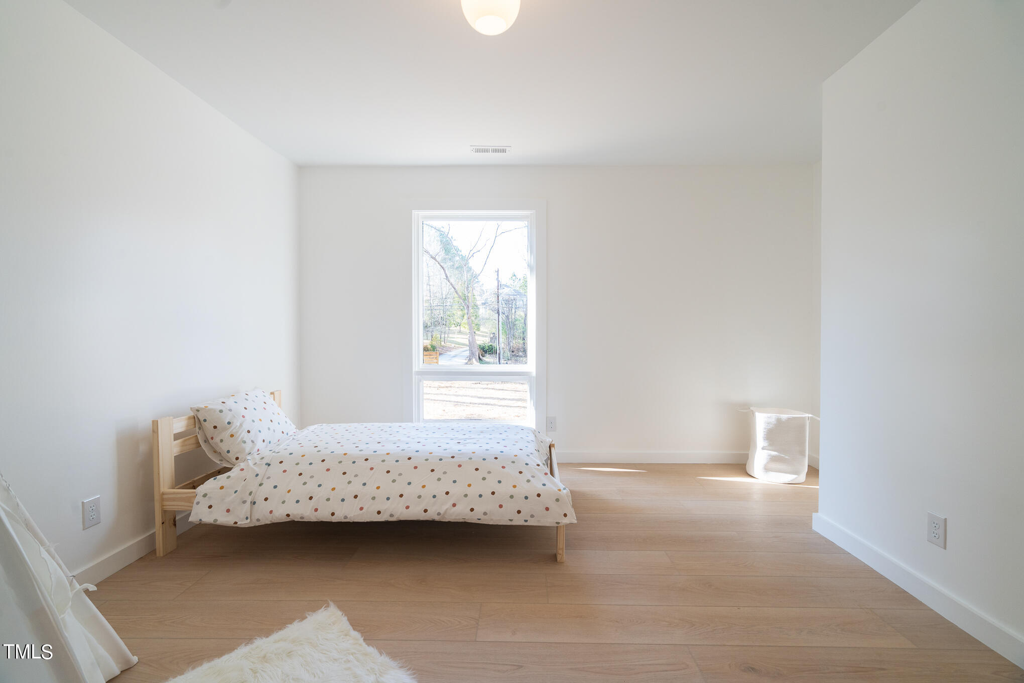 332 Erwin Road Chapel Hill, NC 27514 - Photo 17 of 35 a room with a baby crib and a couch