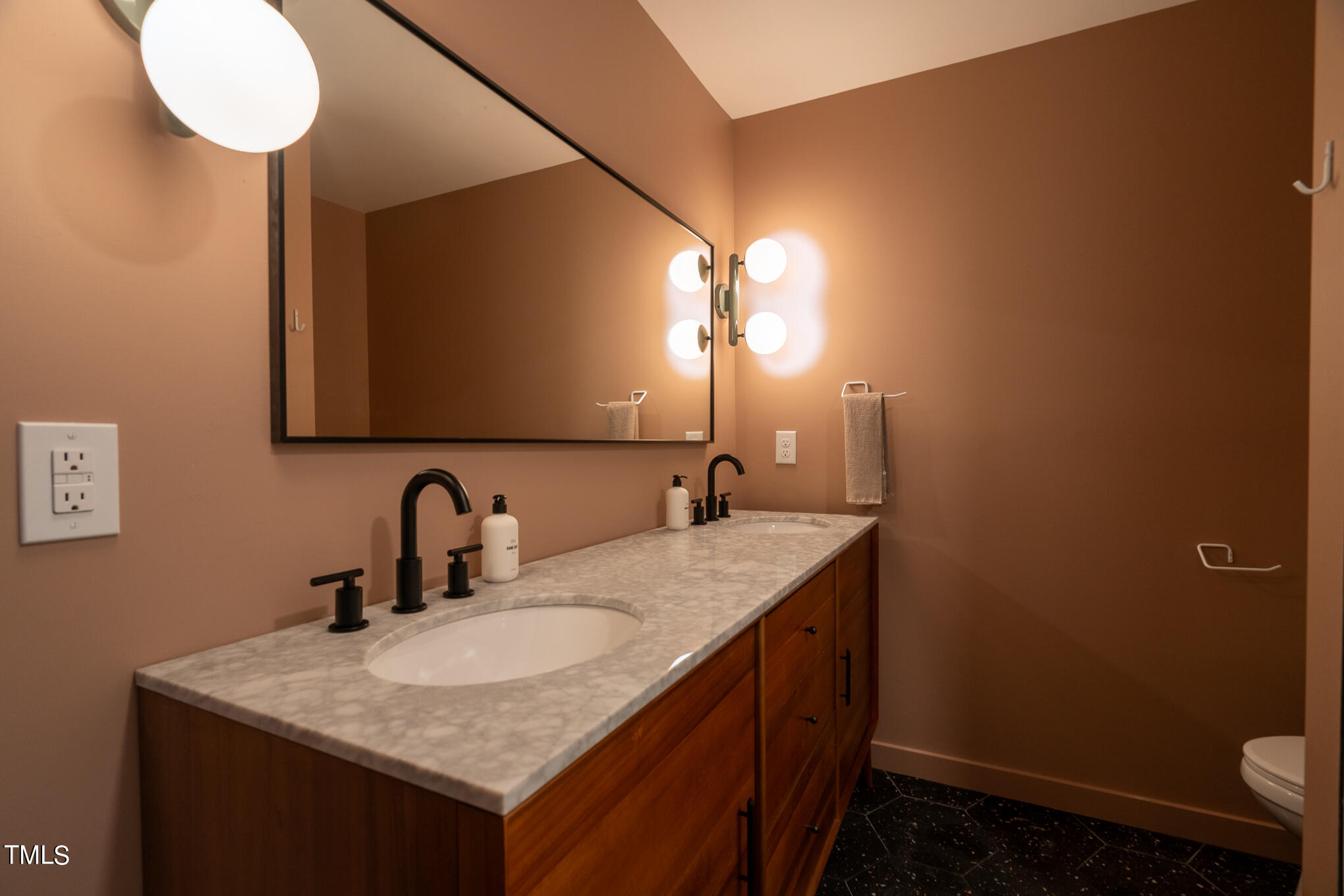 332 Erwin Road Chapel Hill, NC 27514 - Photo 18 of 35 a bathroom with a granite countertop sink a toilet and a mirror