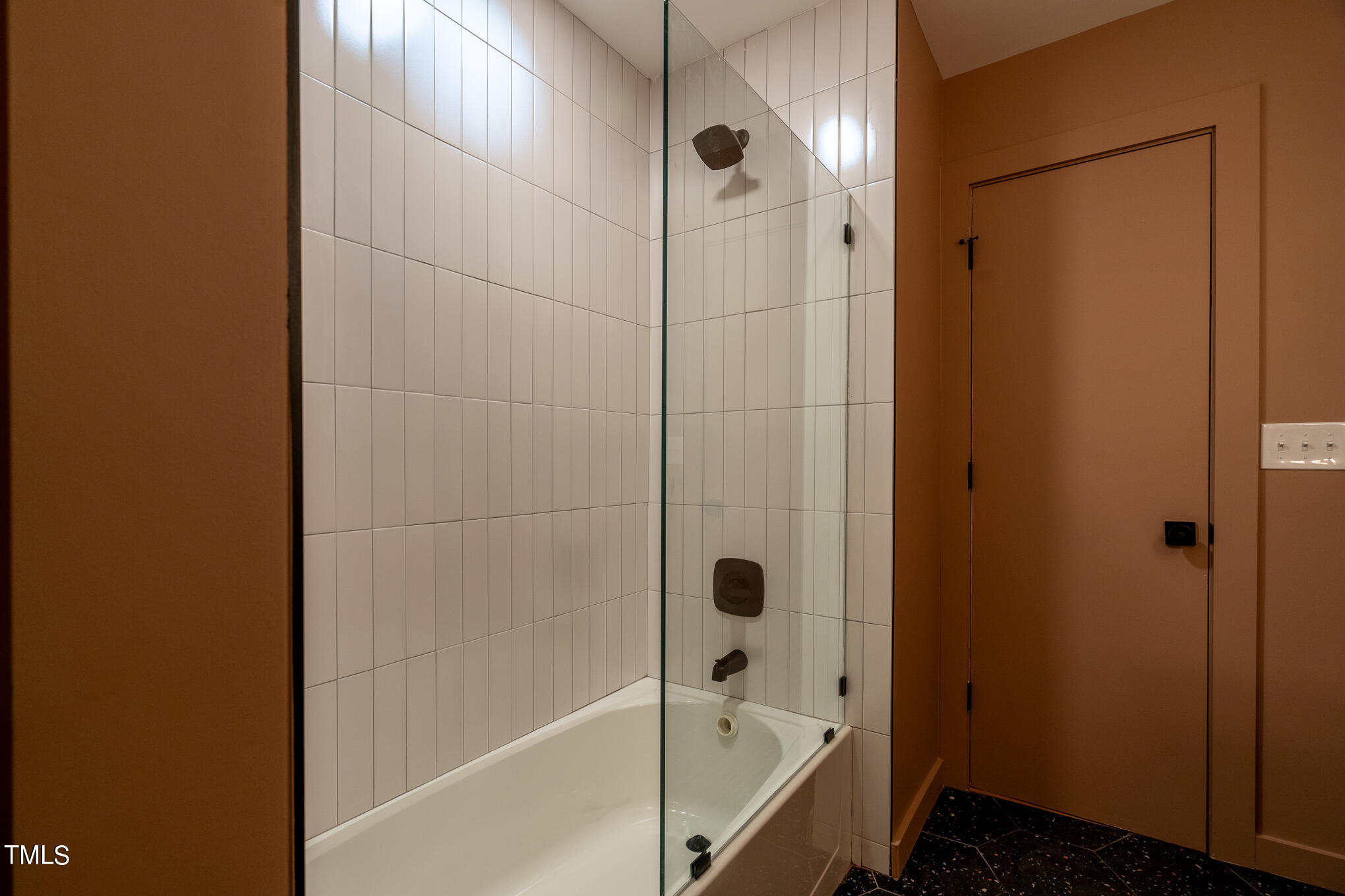 332 Erwin Road Chapel Hill, NC 27514 - Photo 19 of 35 a bathroom with a glass shower door