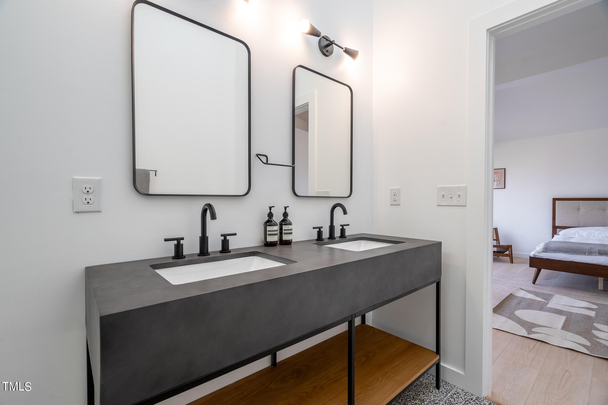 332 Erwin Road Chapel Hill, NC 27514 - Photo 24 of 35 a bathroom with a sink and a mirror