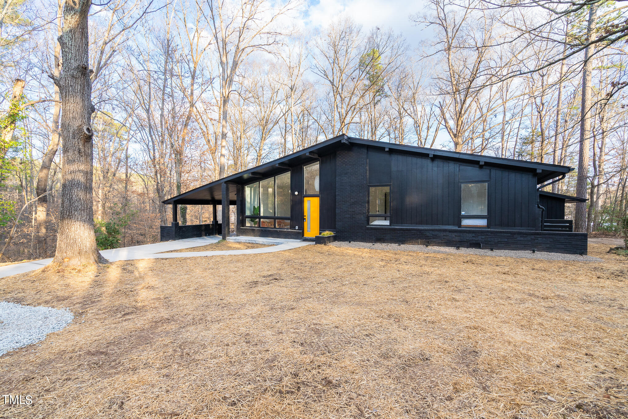 332 Erwin Road Chapel Hill, NC 27514 - Photo 34 of 35 a front view of a house with a yard and garage