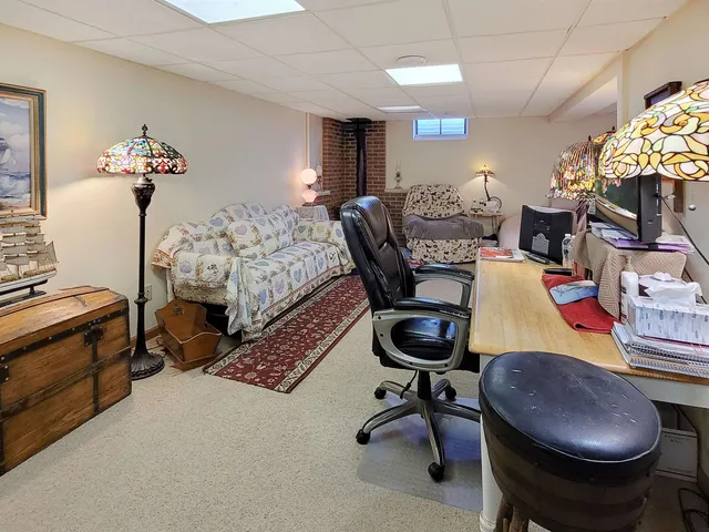 a bathroom with a sink toilet and mirror