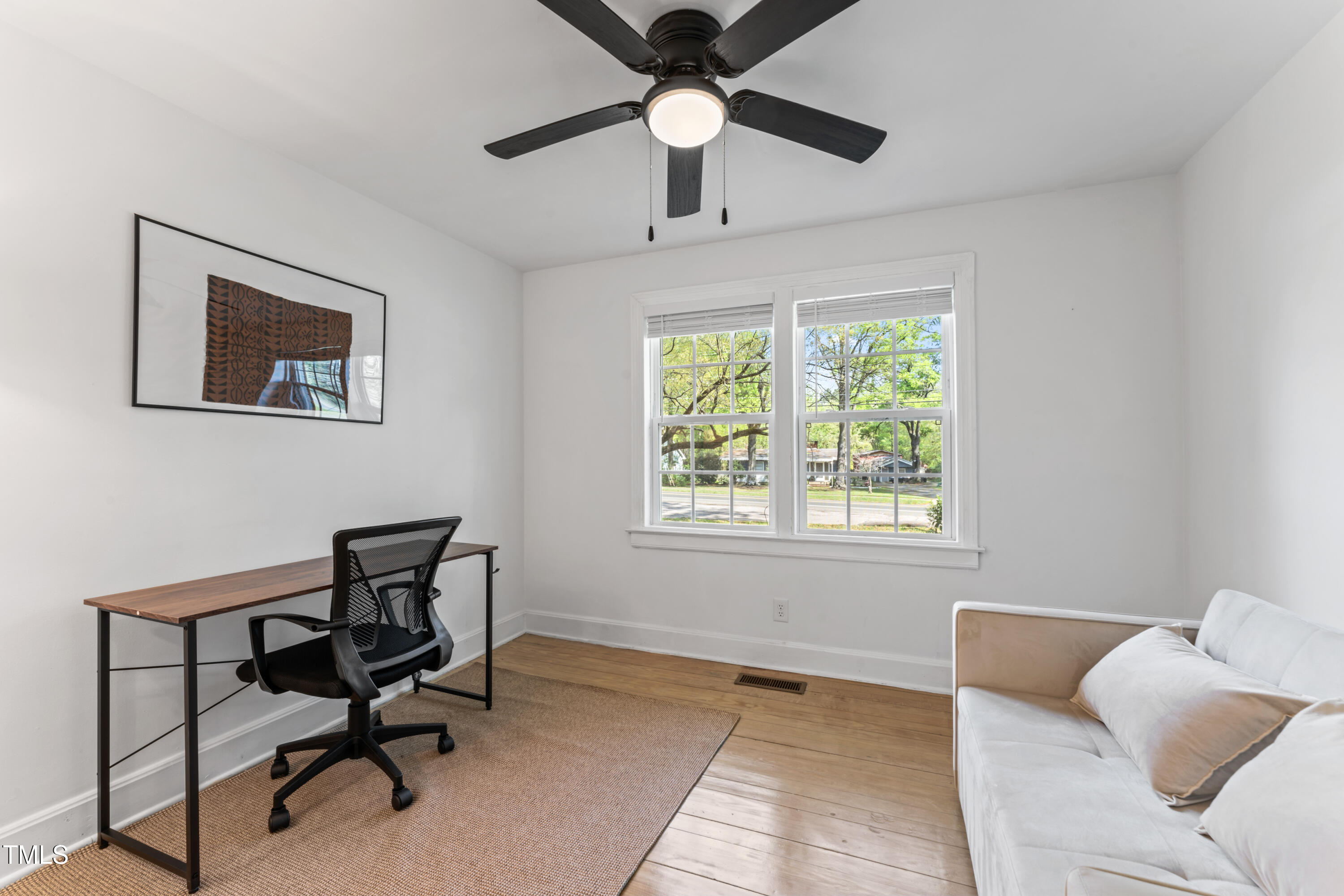 711 Horton Road Durham, NC 27704 - Photo 18 of 28 a workspace with a large window