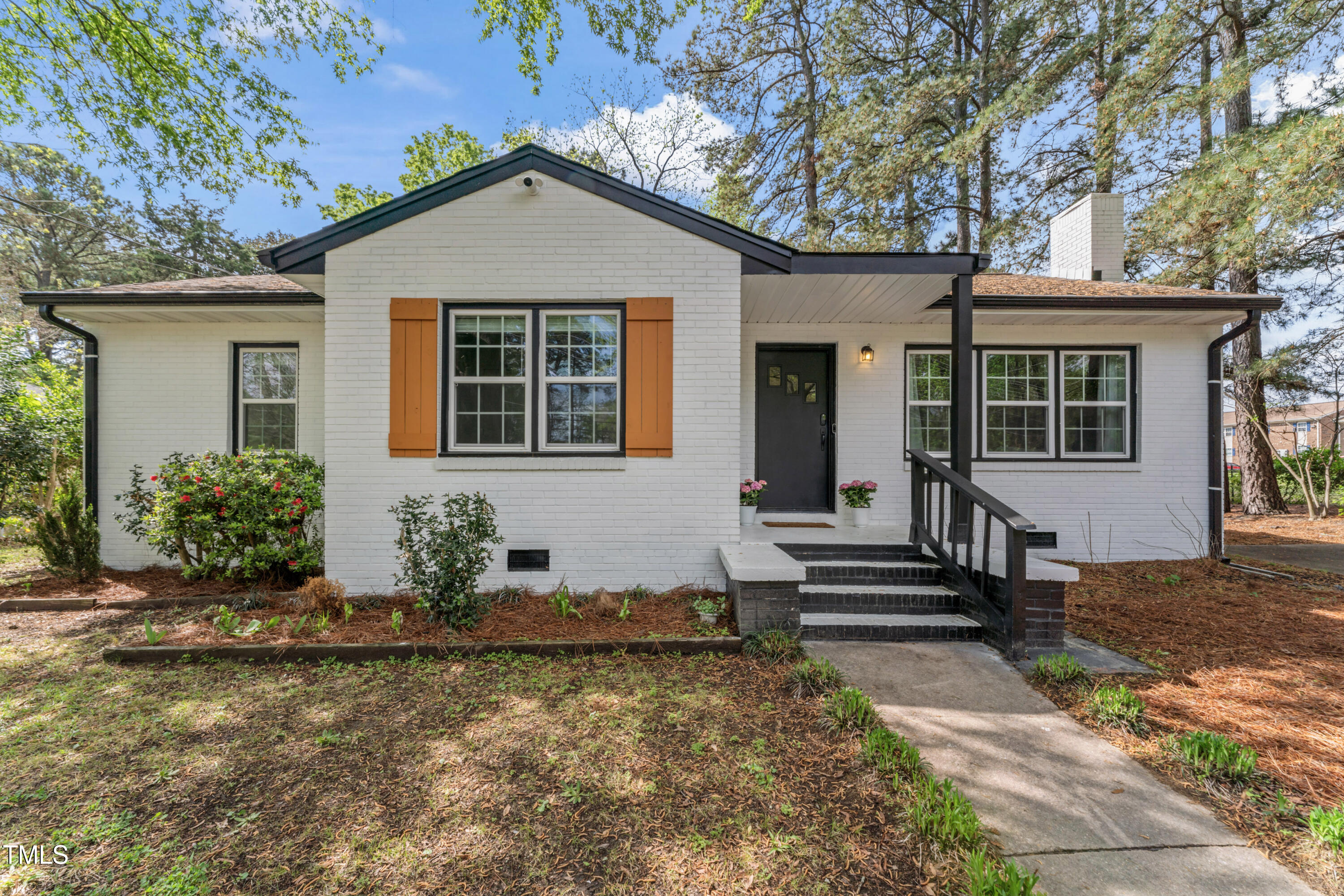 711 Horton Road Durham, NC 27704 - Photo 2 of 28 a front view of a house with a yard