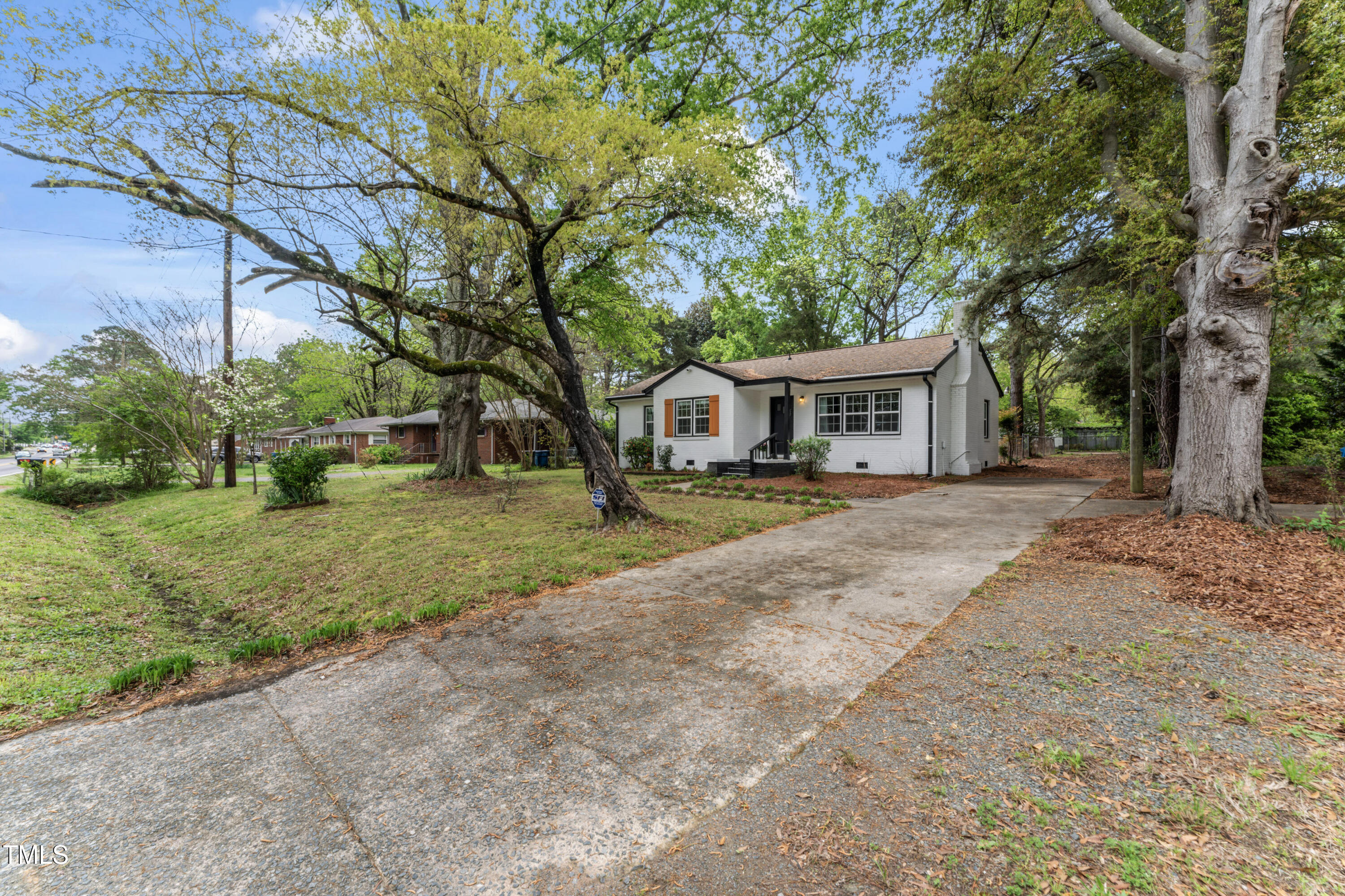 711 Horton Road Durham, NC 27704 - Photo 27 of 28 a front view of a house with a yard