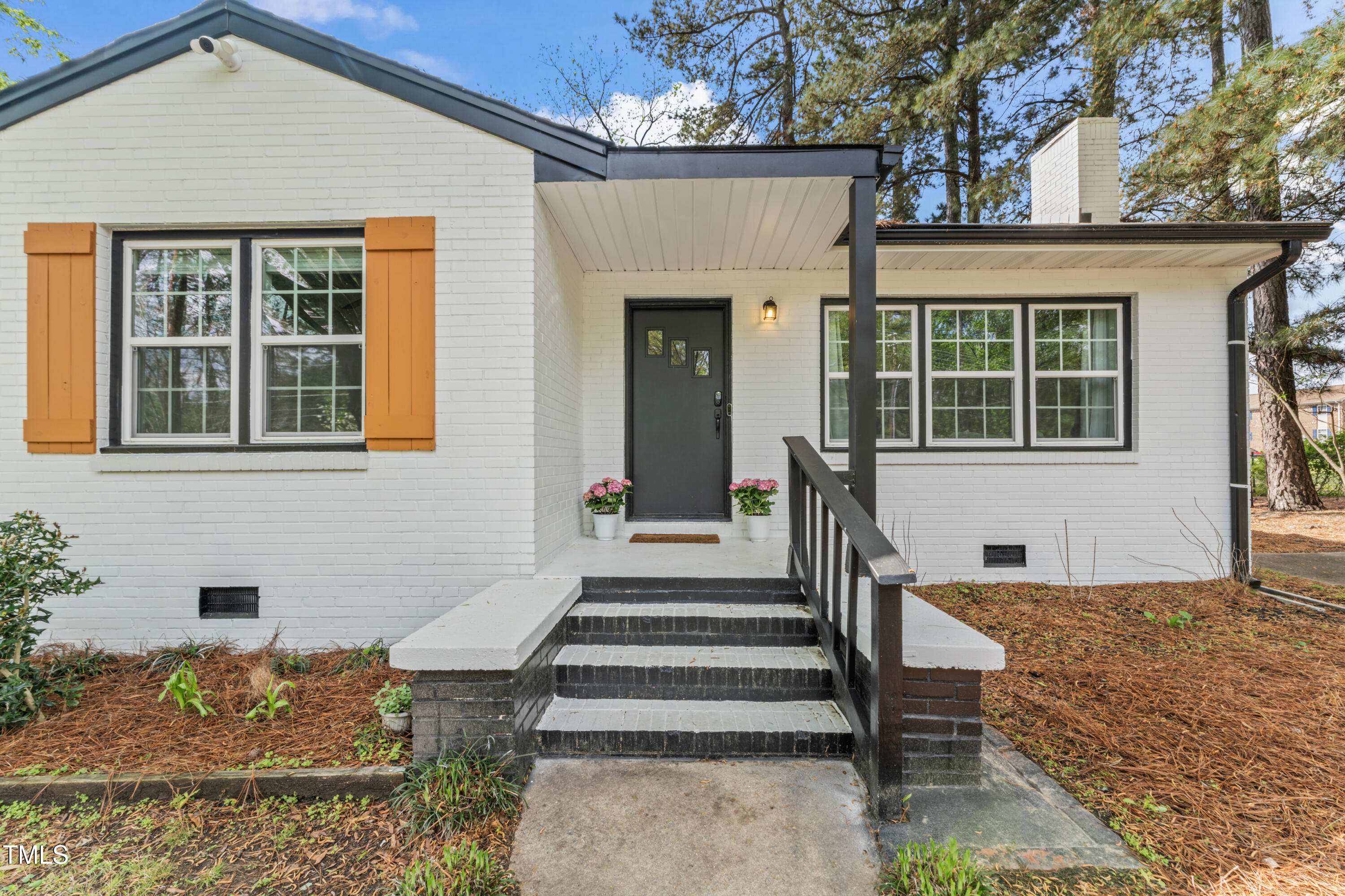 711 Horton Road Durham, NC 27704 - Photo 3 of 28 front view of a house with a yard