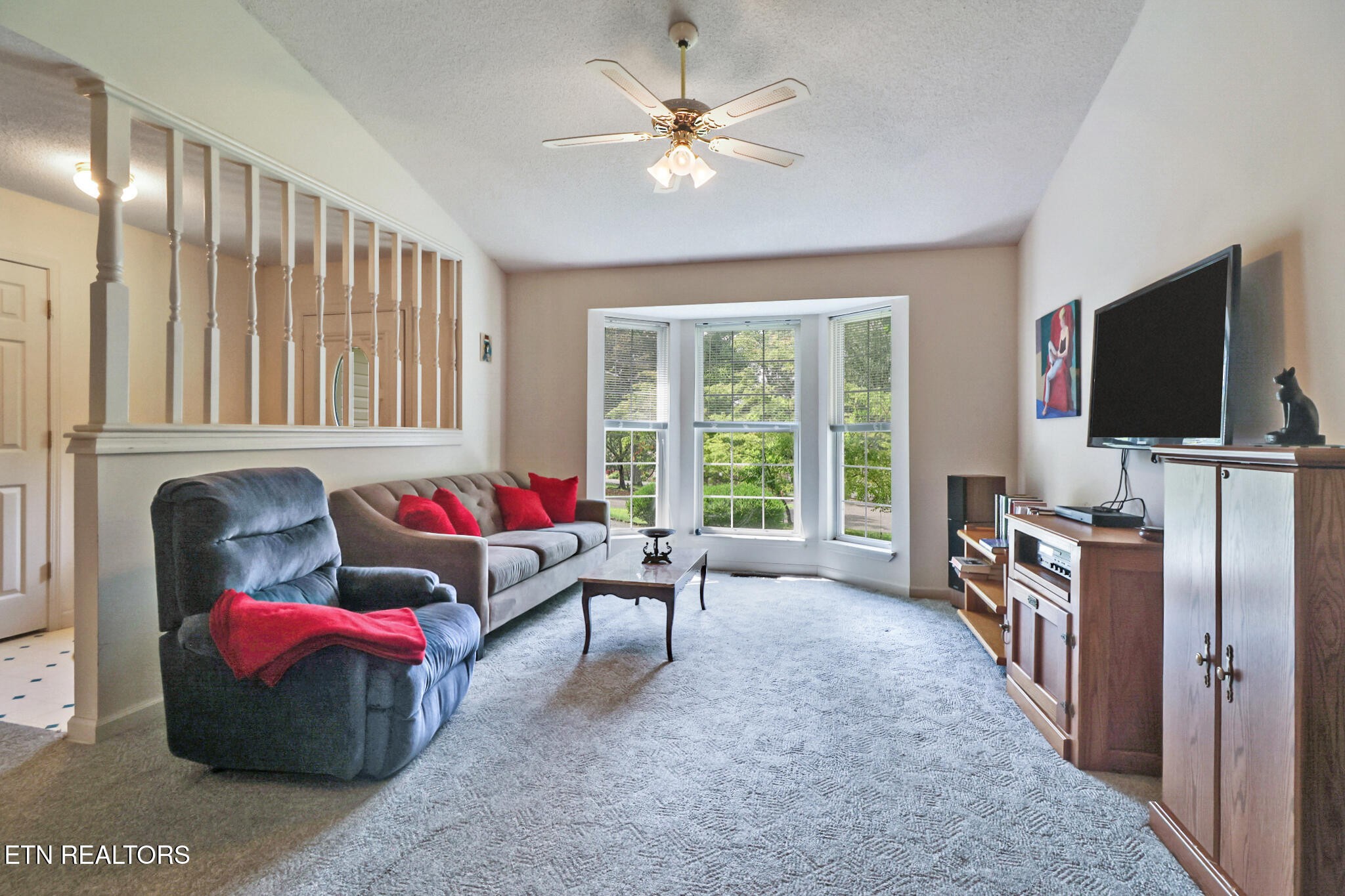 101 Ashdown Lane Crossville, TN 38558 - Photo 12 of 34 a living room with furniture and a flat screen tv