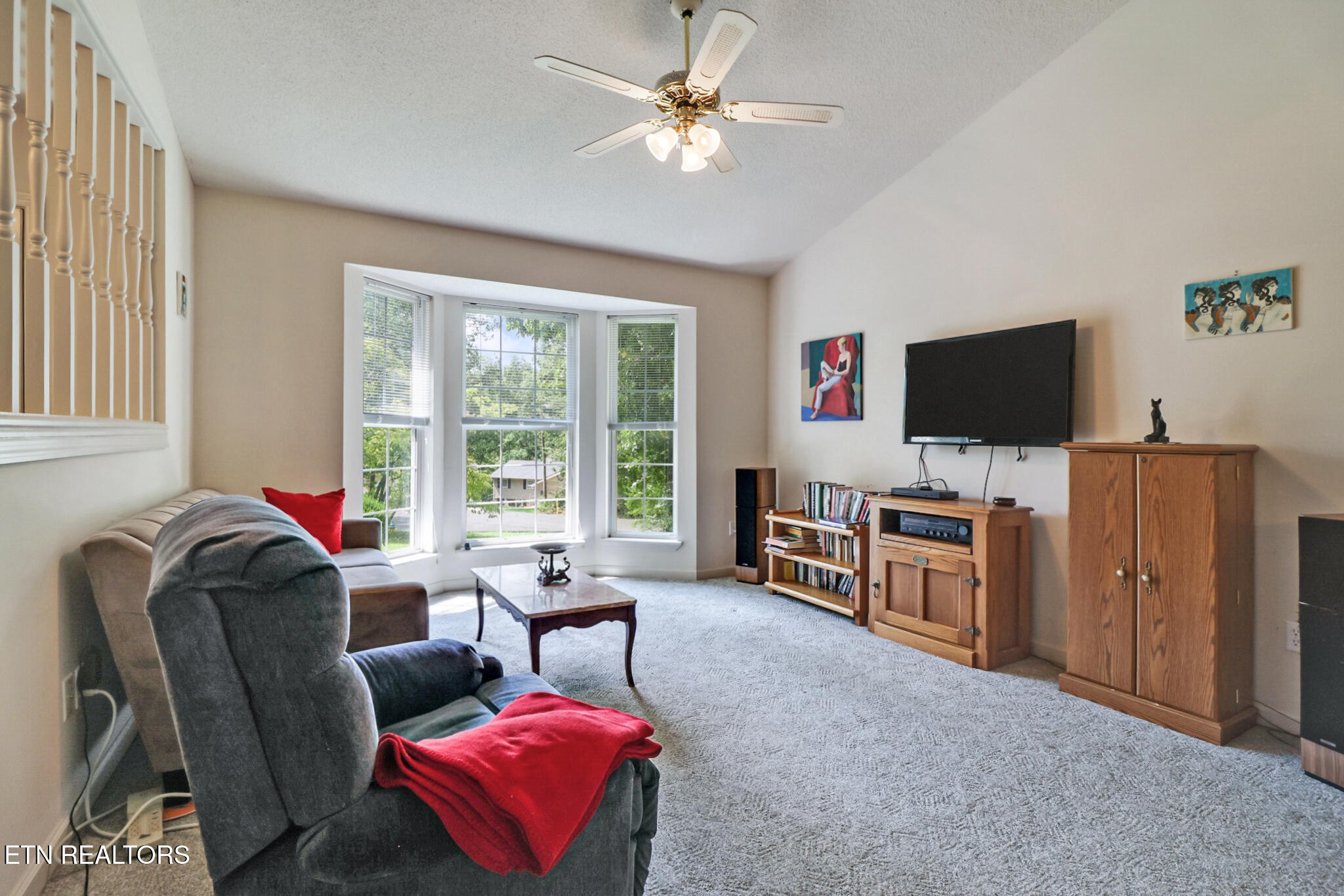 101 Ashdown Lane Crossville, TN 38558 - Photo 14 of 34 a living room with furniture and a flat screen tv