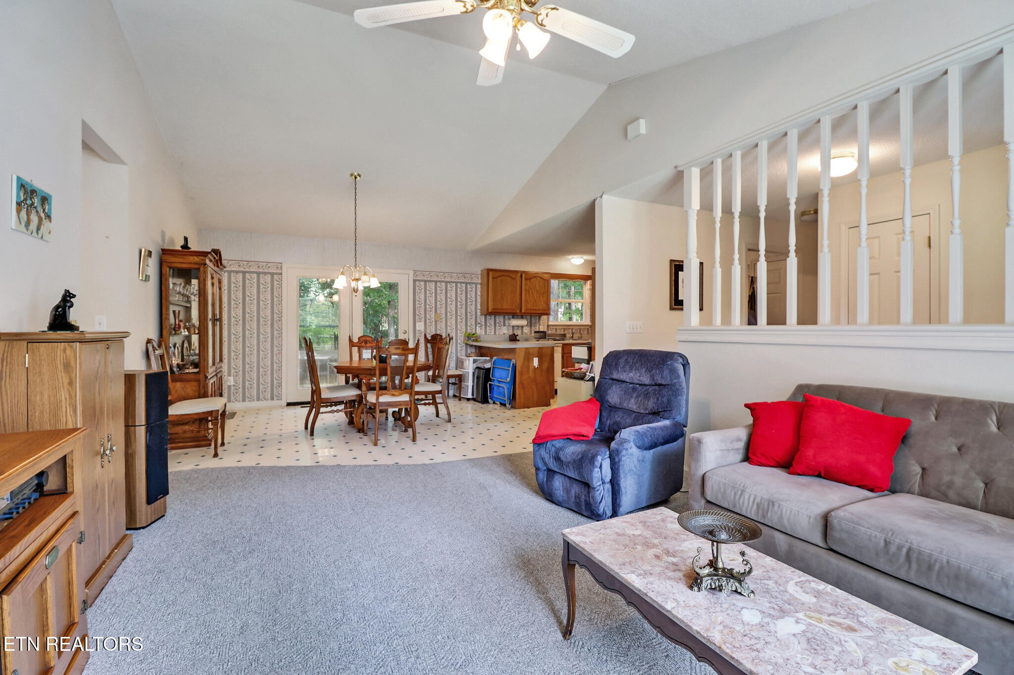 101 Ashdown Lane Crossville, TN 38558 - Photo 15 of 34 a living room with furniture and a chandelier