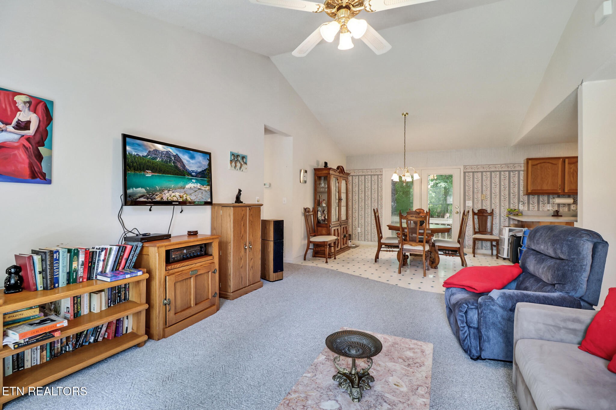 101 Ashdown Lane Crossville, TN 38558 - Photo 16 of 34 a living room with furniture and a flat screen tv