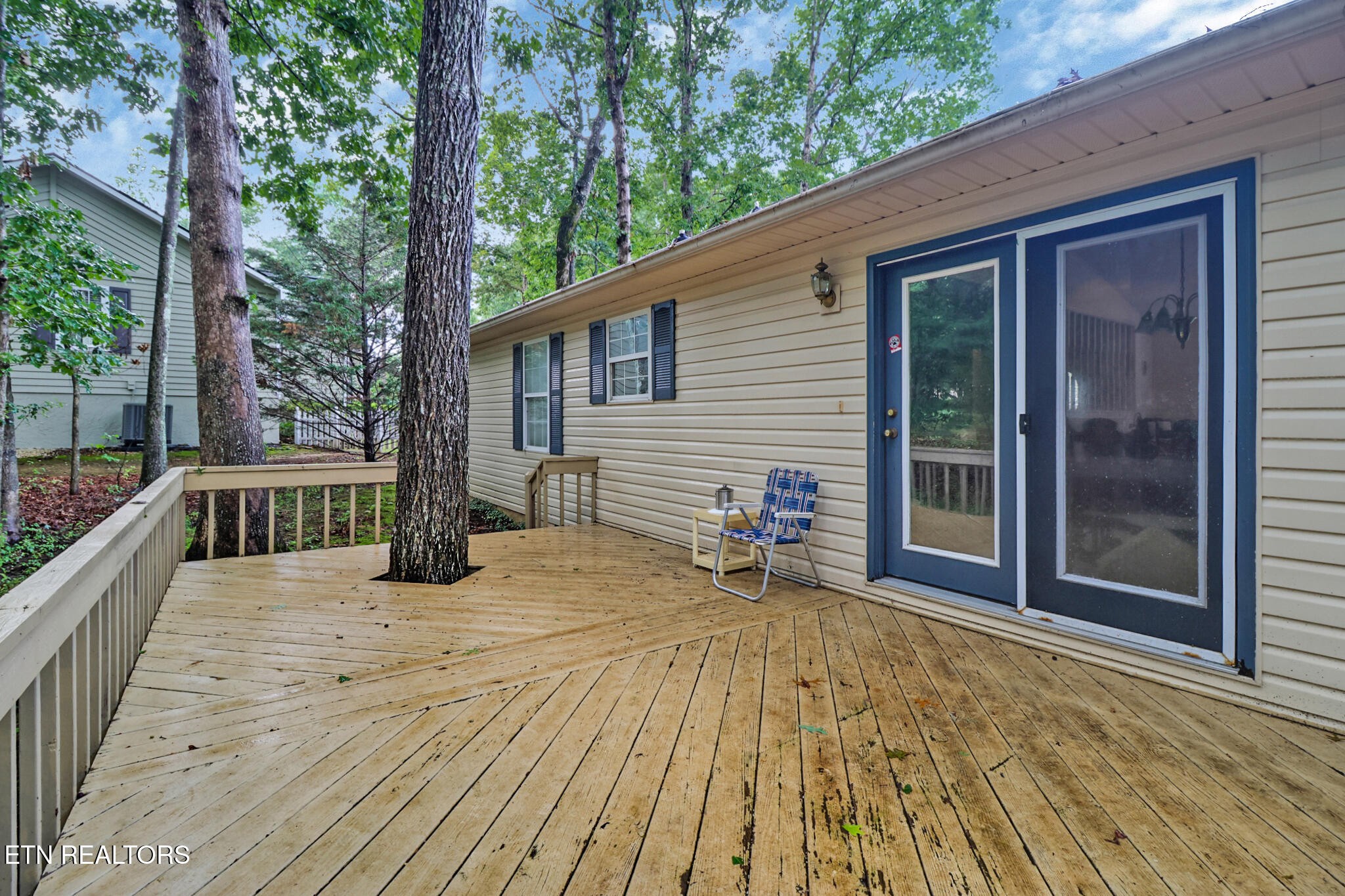 101 Ashdown Lane Crossville, TN 38558 - Photo 8 of 34 a view of a house with backyard and sitting area