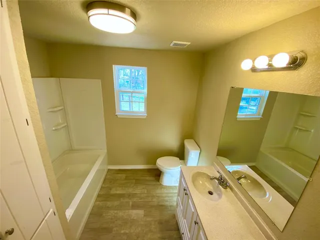 a bathroom with a bathtub